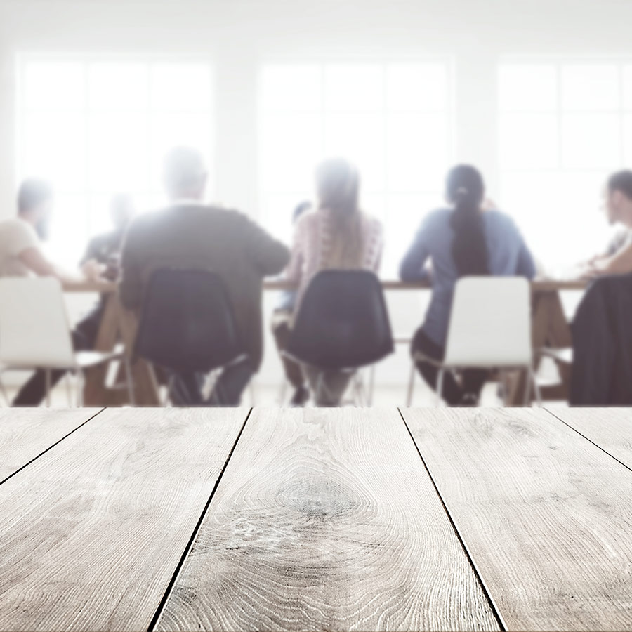 Individuals gathered around a table